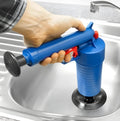 Plastic high-pressure drain blaster gun with four different sized adaptors for unclogging sinks and toilets