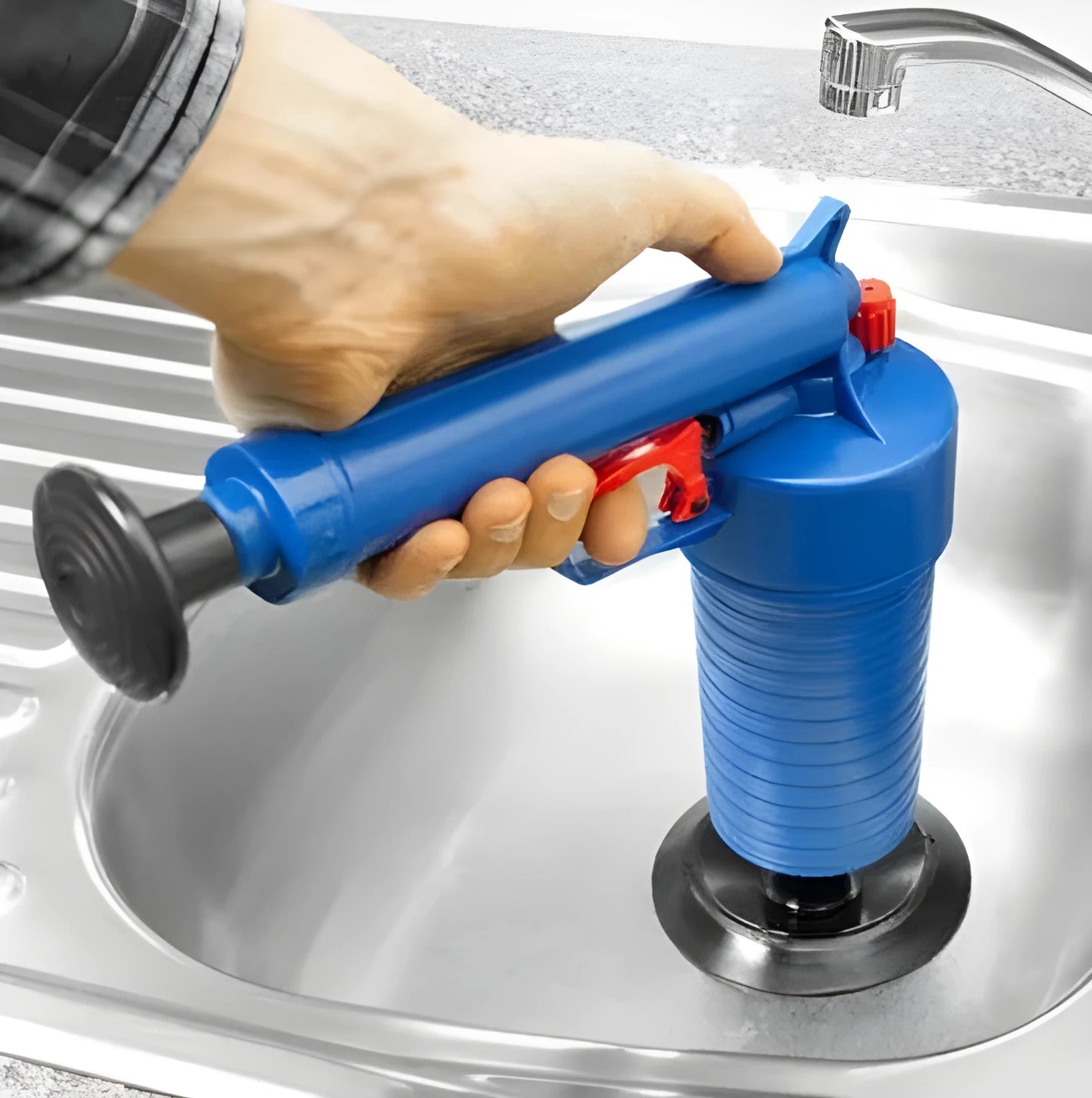 Plastic high-pressure drain blaster gun with four different sized adaptors for unclogging sinks and toilets