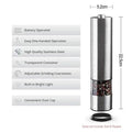 Stainless steel electric pepper grinder on a kitchen countertop.