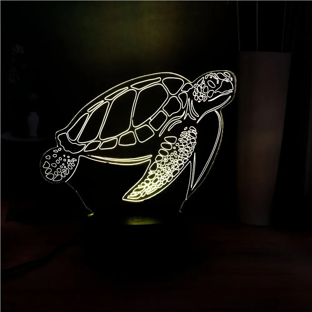 3D acrylic turtle LED night light showing colour-changing illumination