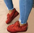 Women's white cotton casual shoes with round toe and non-slip rubber sole.