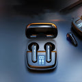 Wireless black semi-in-ear Bluetooth earphones showing digital battery display on earpiece