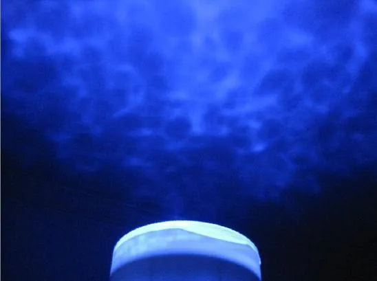 Blue Ocean LED projector lamp showing DLP trapezoidal correction for wall projection.