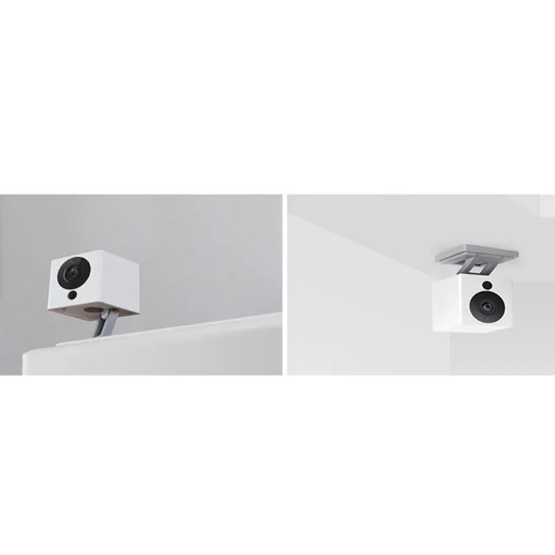 White compact indoor night vision security camera with 1080P resolution and 110° wide-angle lens on a shelf