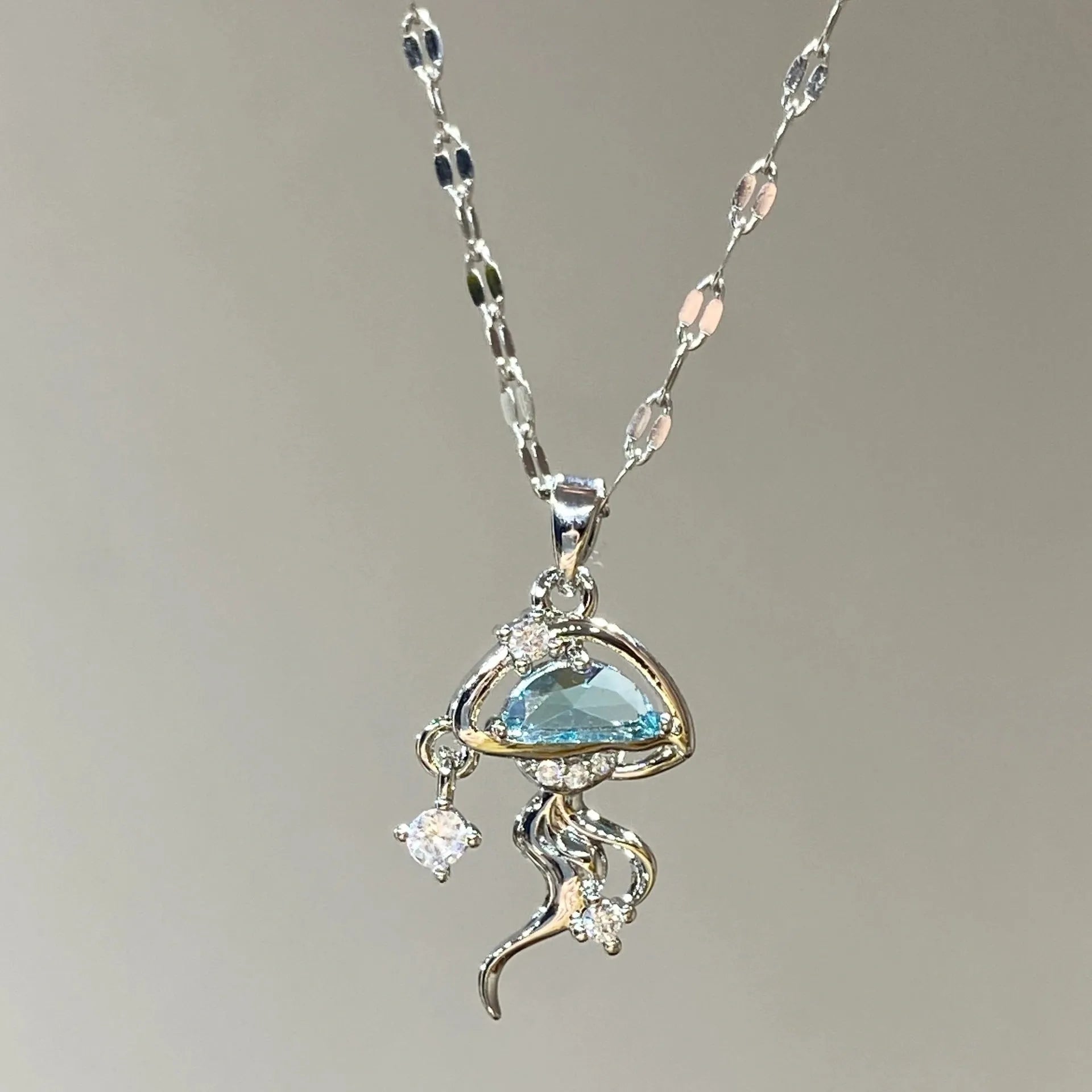 S925 sterling silver blue jellyfish necklace with white gold colour finish on adjustable chain