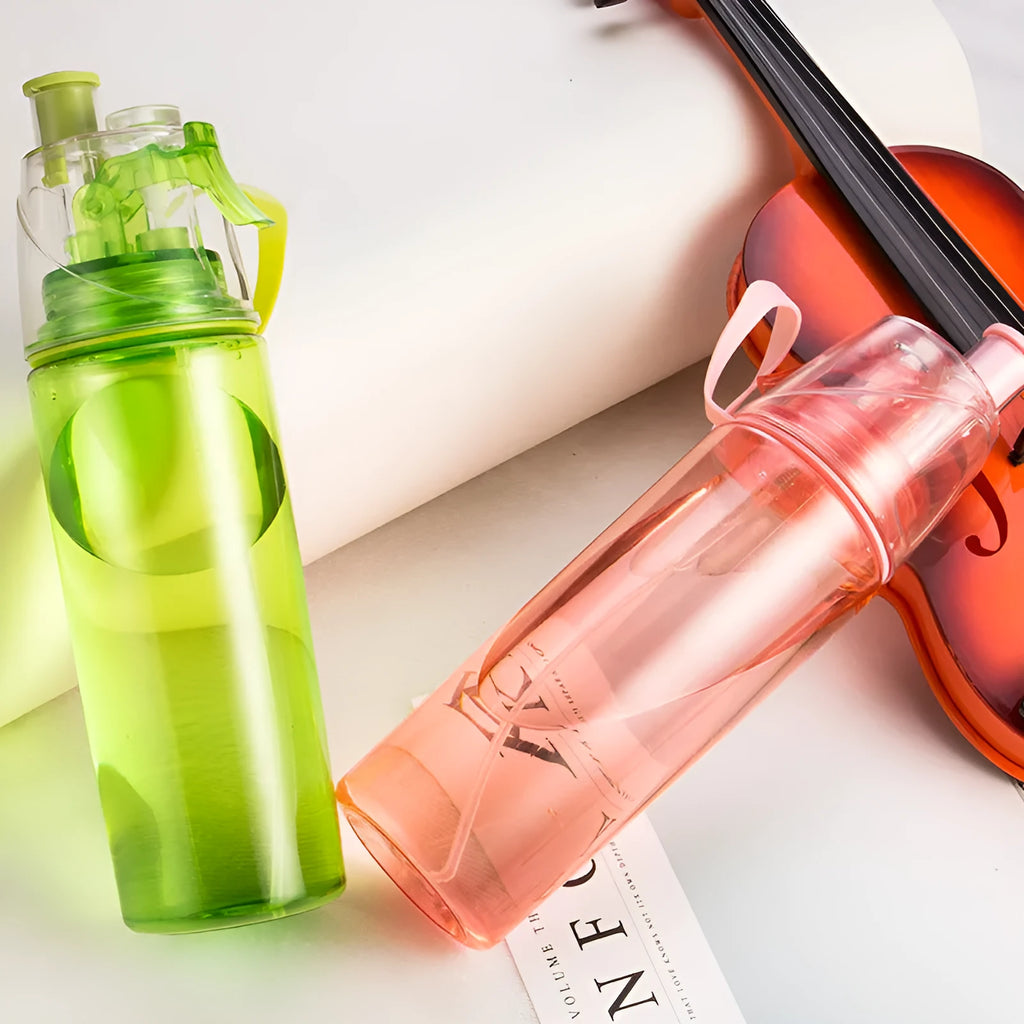 600ml ABS plastic spray water bottle with push-button mist spray, shown in pink, black, green, and yellow