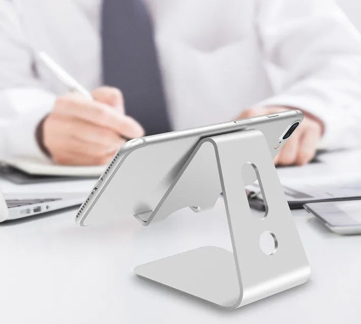 Aluminium alloy universal phone and tablet holder in black, red, rose gold, or silver.