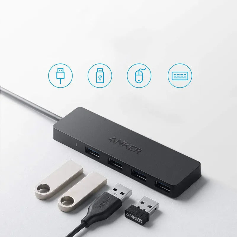 Black Anker 4-port USB 3.0 hub with attached cable on a desk