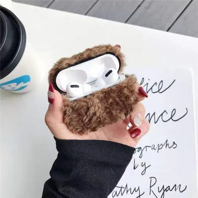 Simple Lamb hard plastic AirPods cover with plush interior in blue, shown next to brown and grey options.