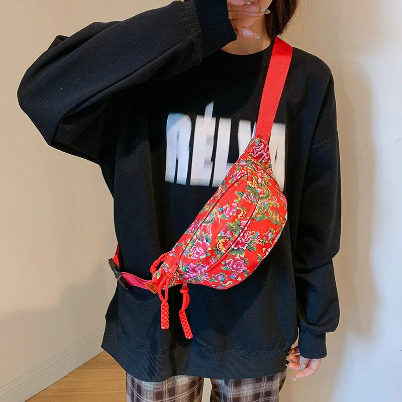 Women's western style waist bag with big flower design and contrast stitching in nylon material