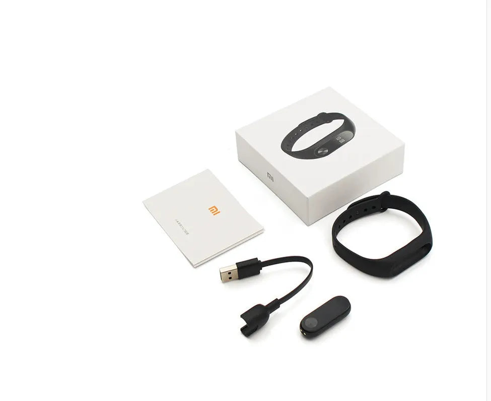 Black Xiaomi Mi Band 2 smartband with OLED display on adjustable wrist strap