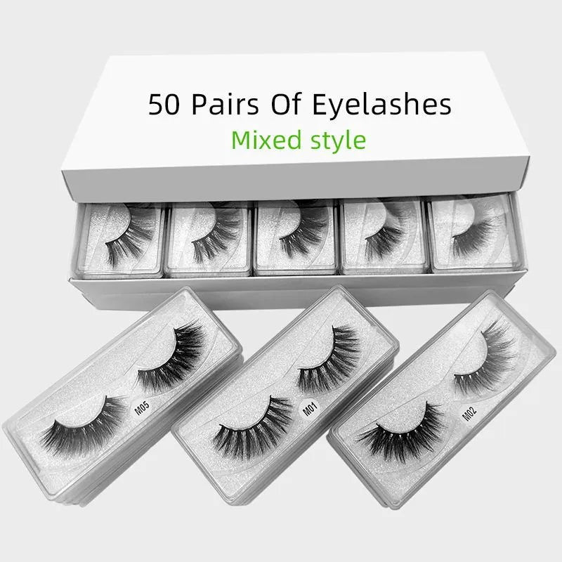 Silver imitation mink false eyelashes with elongated eye tail on a white background