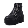 Black women's punk-style short Martin boots featuring a bat buckle, side zipper, and thick heel