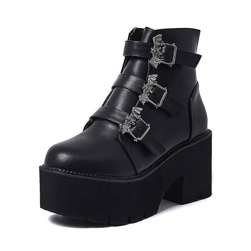 Black women's punk-style short Martin boots featuring a bat buckle, side zipper, and thick heel