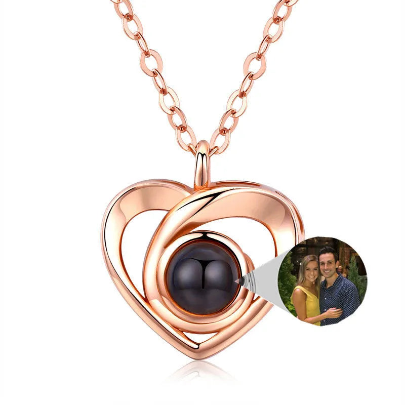 S925 silver heart shaped photo projection pendant necklace with silver finish on white background