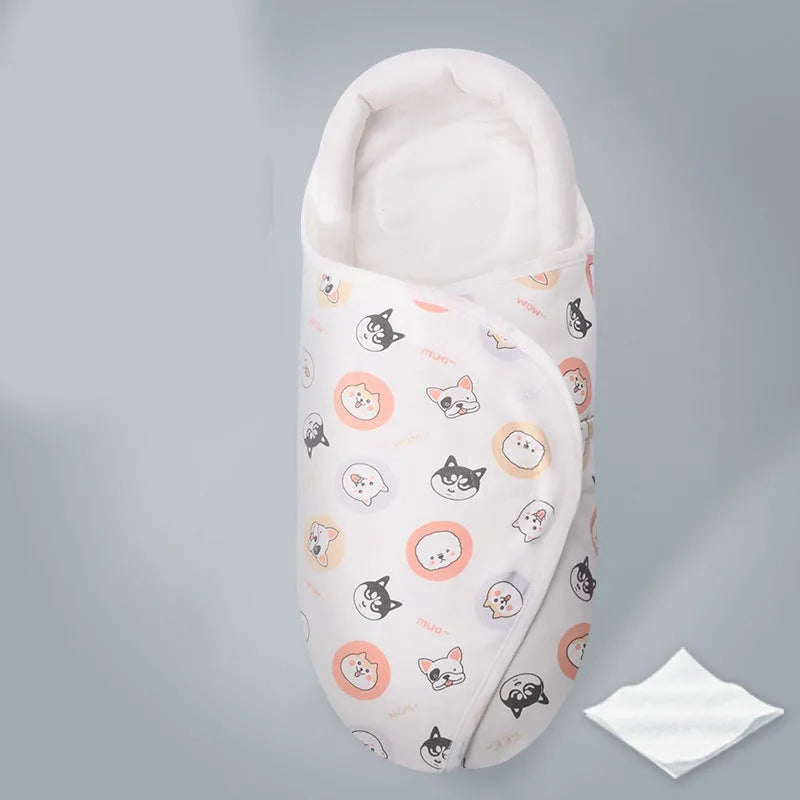 Cotton anti-startle swaddle blanket for babies in a colourful dinosaur print, 30 by 60 cm.