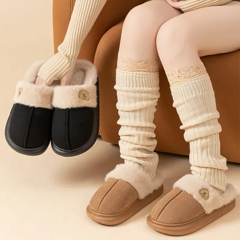Plush fleece slippers with thick PVC sole in five colour options on a white background.
