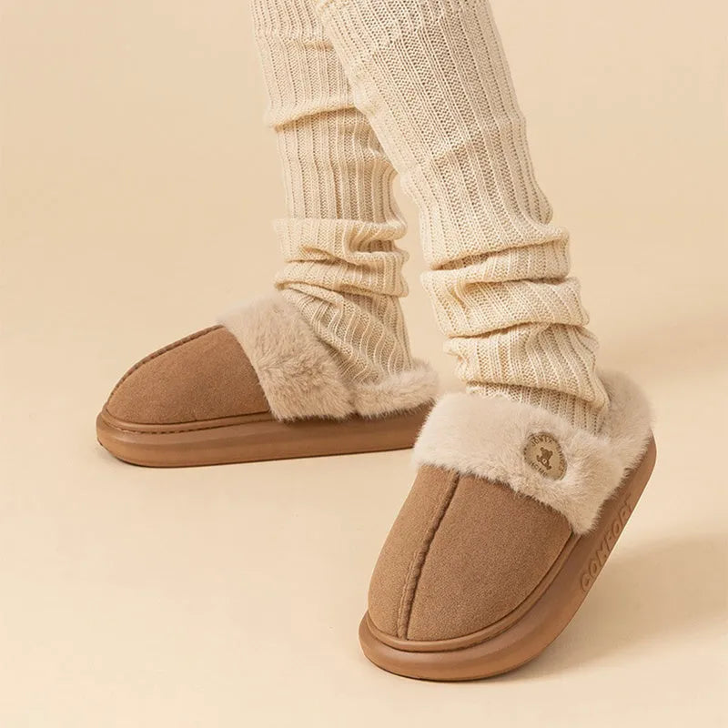 Plush fleece slippers with thick PVC sole in five colour options on a white background.