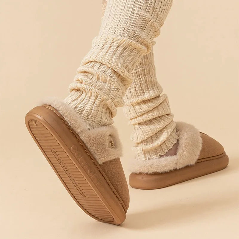 Plush fleece slippers with thick PVC sole in five colour options on a white background.