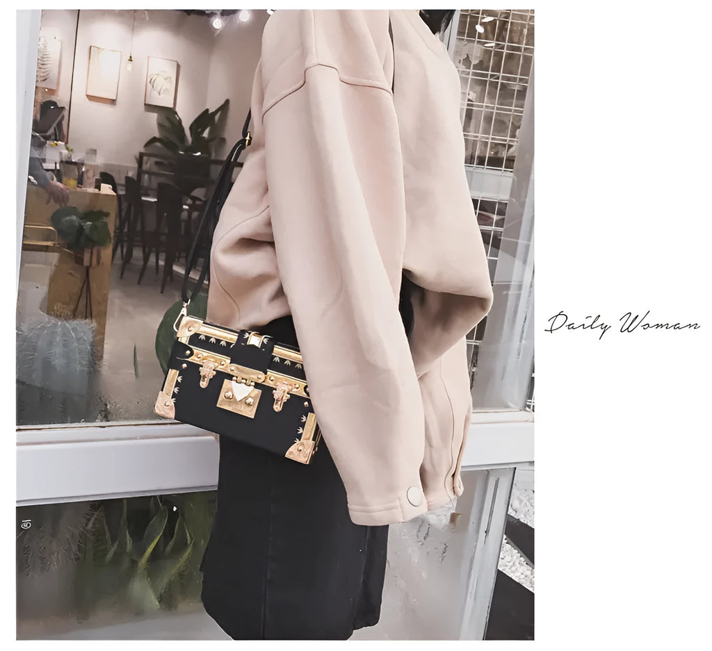 Black hard PU leather women's shoulder bag with flap design and single strap