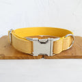 Yellow velvet adjustable dog collar with polyester construction, shown in five sizes from XS to XL