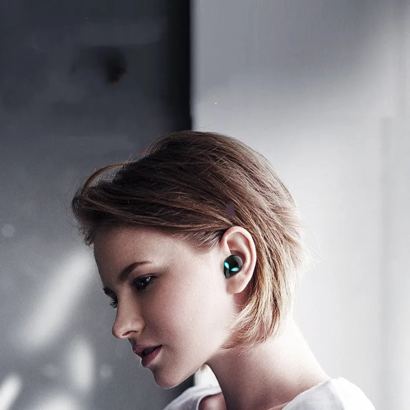 Creative Outer T8 Starman black wireless Bluetooth earphones with alien design in charging case