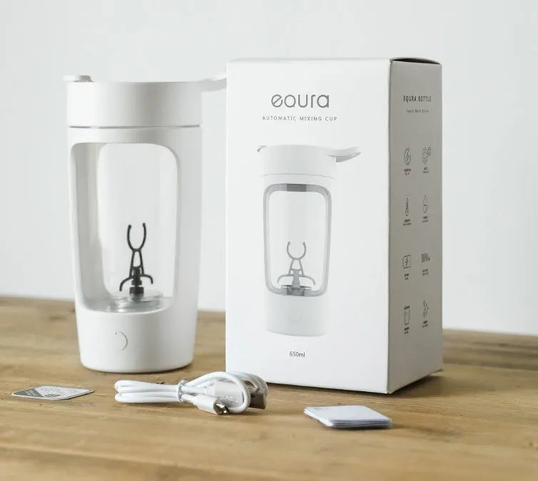 Portable USB-rechargeable blender cup in black, blue, pink or white, showing 650ml capacity markings.