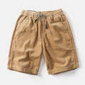 Men's khaki cargo shorts with straight leg cut and retro American street style design