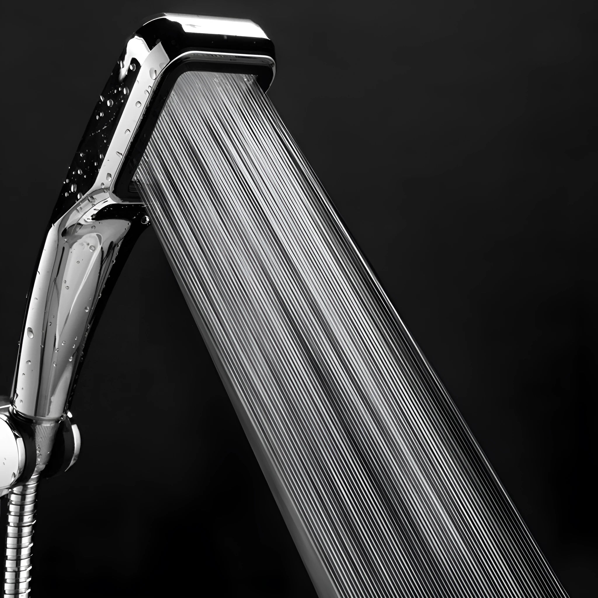 Orange hand-held pressurised shower head with wall bracket and installation hardware sets