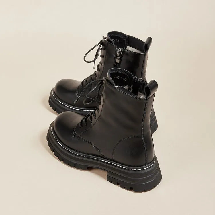 Retro British style platform ankle boots with front lace-up, horseshoe heel, and visible stitching in black