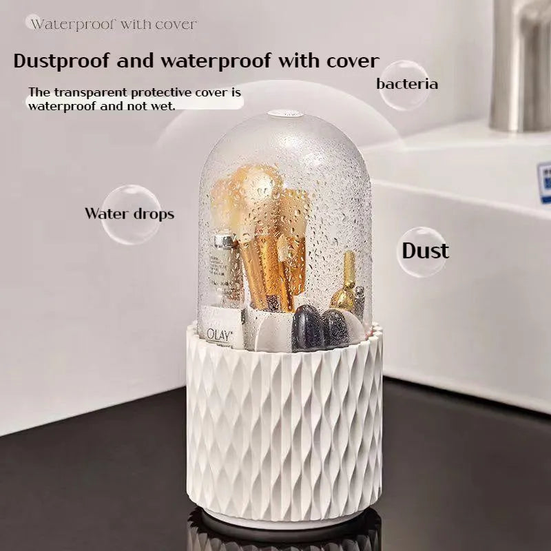 White rotating makeup brush storage box with transparent dust-proof cover on desktop