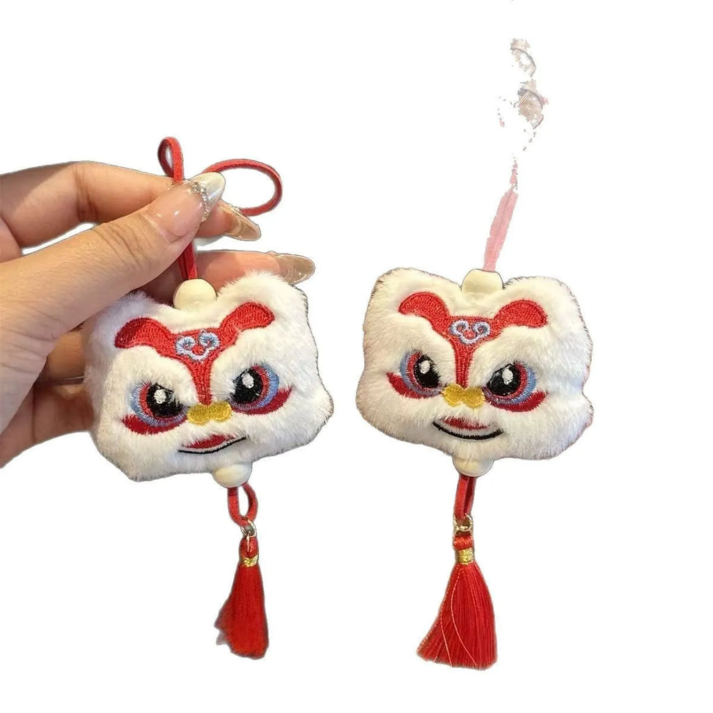Handmade Chinese style plush lion tassel ornament keychain with star stone details in blue colour