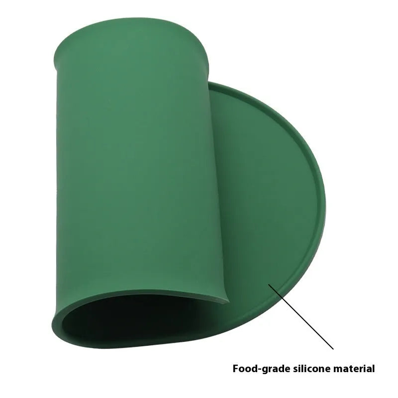 Silicone waterproof cat feeding placemat in green colour showing bowl placement