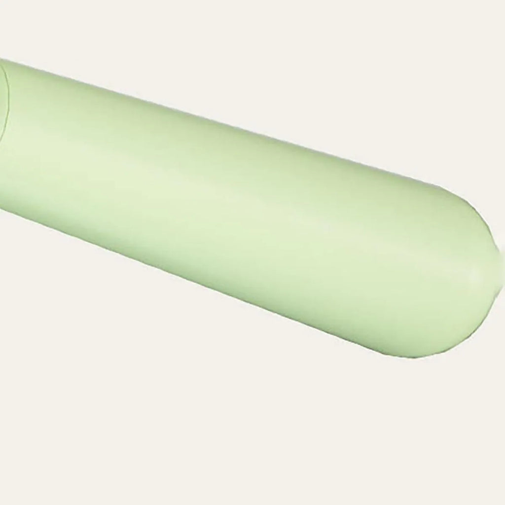 Blue dinosaur-shaped double-sided self-cleaning cat brush for grooming.