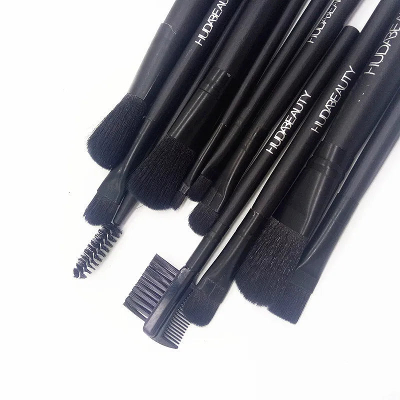 12-piece black makeup brush set in metal tin box with wooden handles and corrugated silk nylon bristles