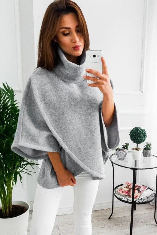 Women's longline batwing sleeve cardigan in plus velvet, shown in grey colour with three-button front.