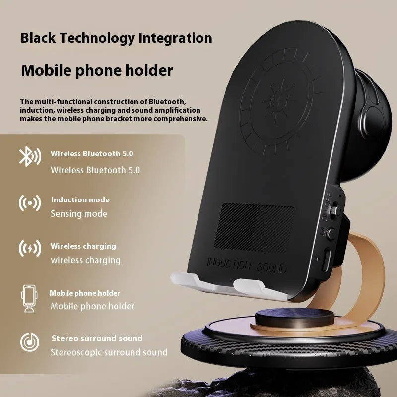 Black Gold folding Bluetooth mobile phone stand with wireless charger pad on a desk