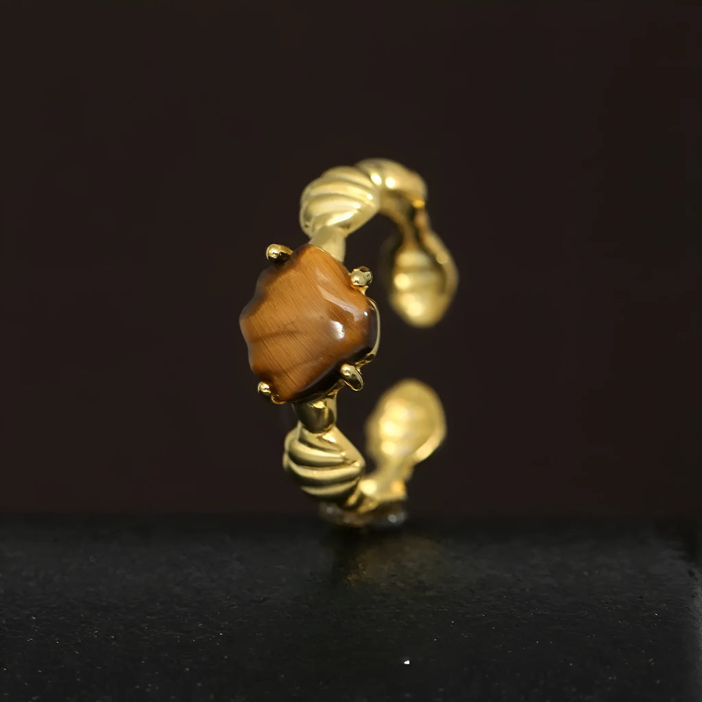 Adjustable silver ring with shell design and tiger eye gemstone in gold electroplated finish