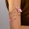 Personalised hollow pattern alloy armband in pink or purple colour with engraved lines.
