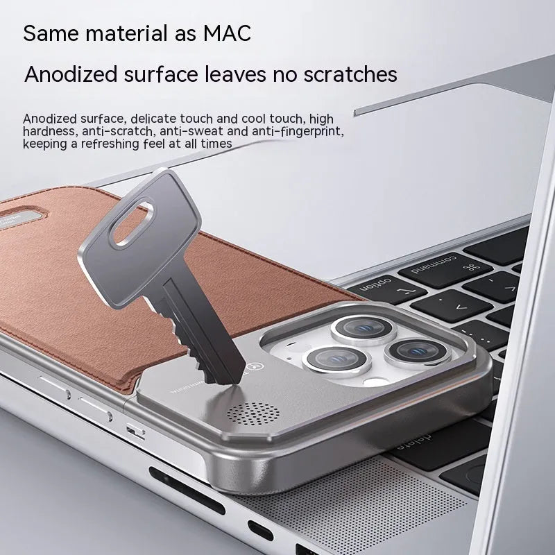 Black aluminium alloy metal half-pack phone case for Apple iPhone on a clean surface showing machined texture