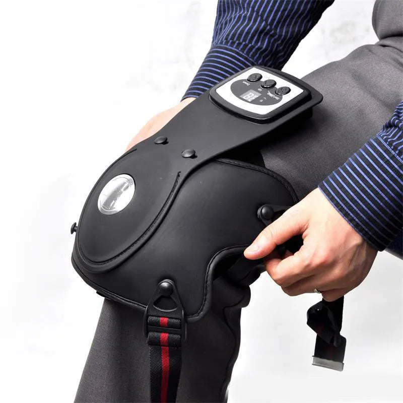 Infrared knee and shoulder massager unit with adjustable temperature control and separate pads.