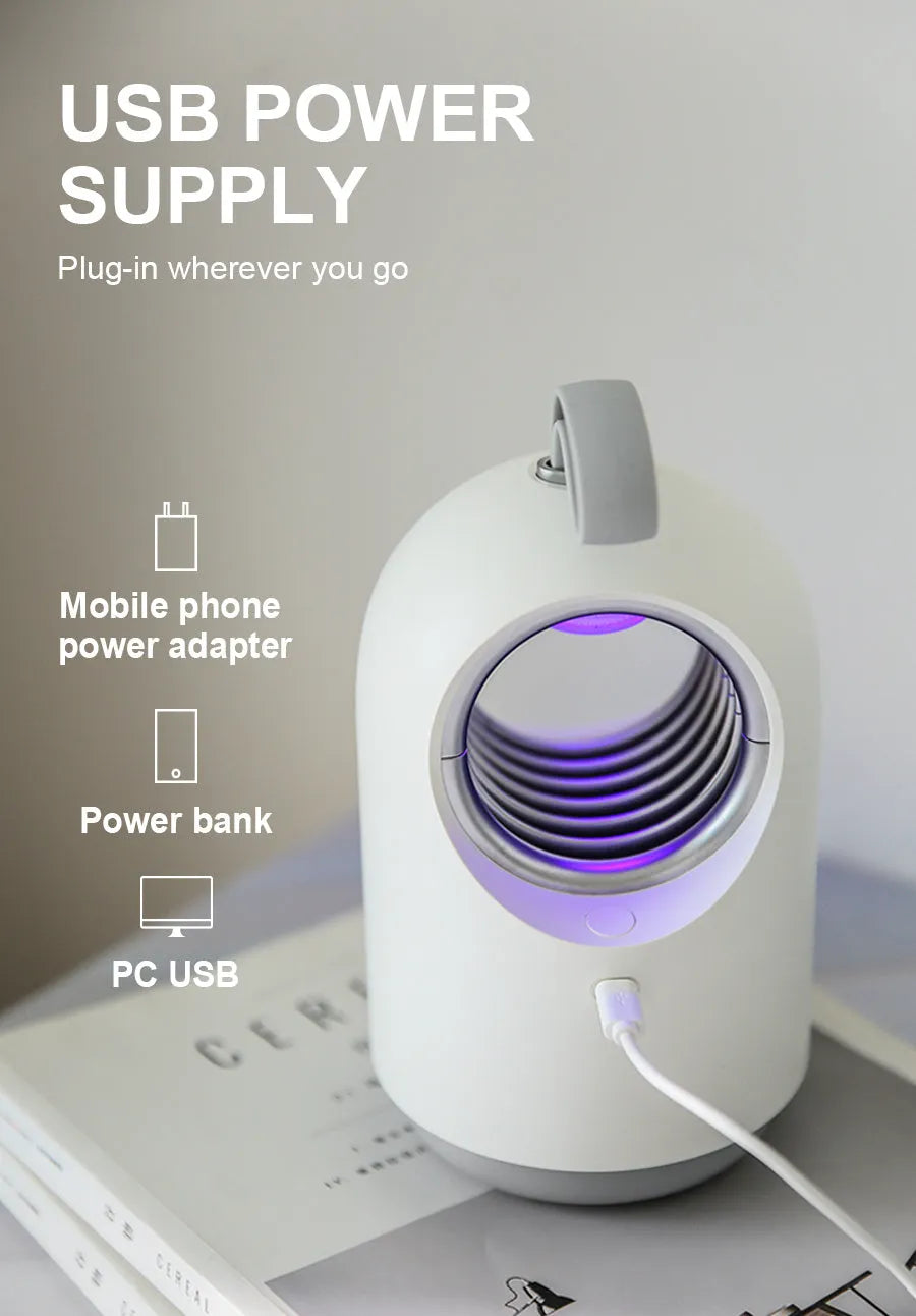 White and blue indoor mosquito killer lamp with UV light and silicone handle
