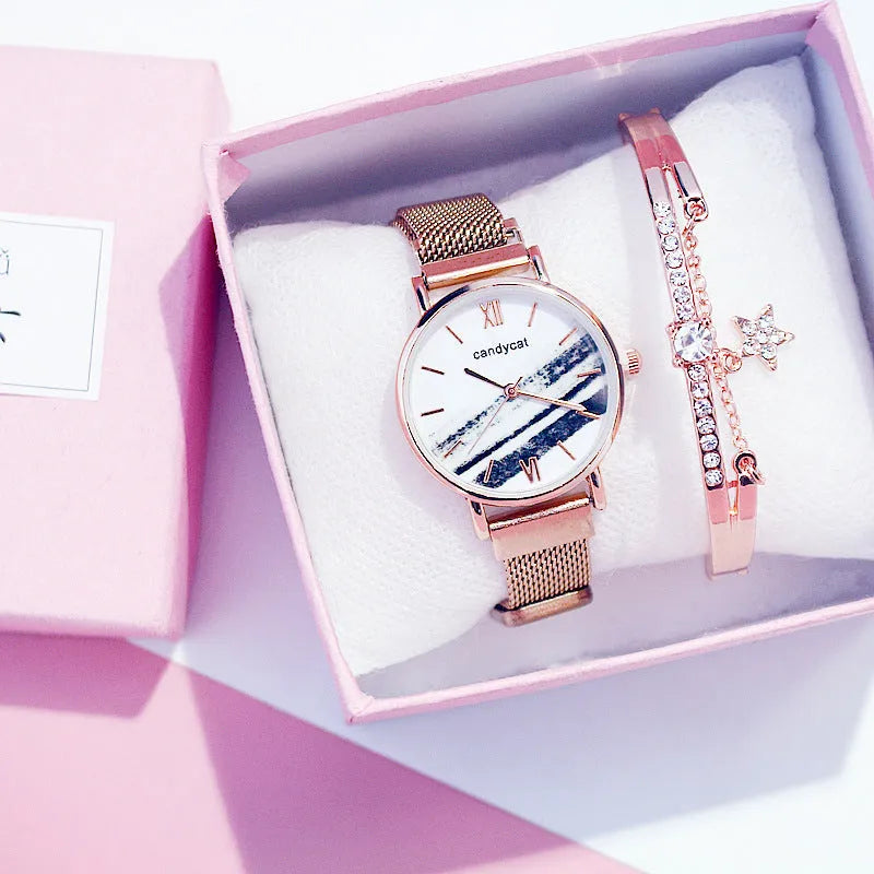 Women's retro marble watch with 32mm round dial, alloy strap, and magnetic buckle on white background