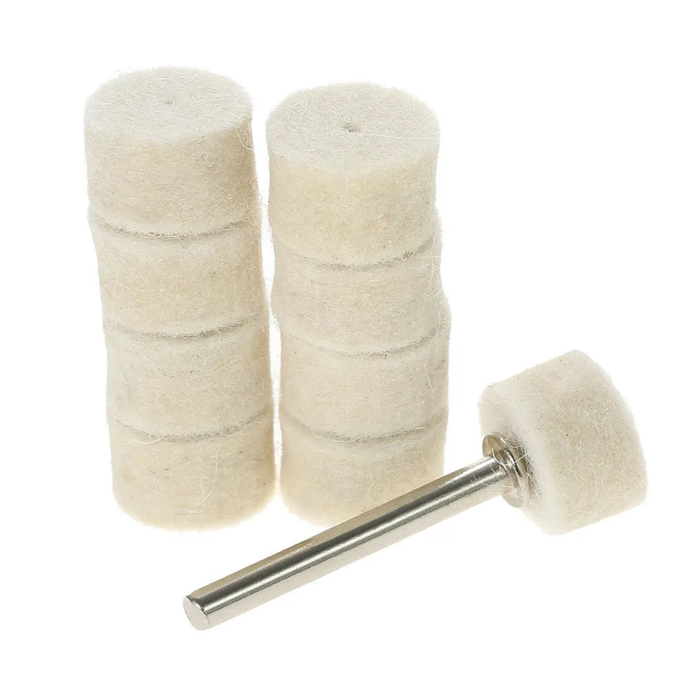 129 piece polishing wheel kit with white wool brushes and metal handles on a table