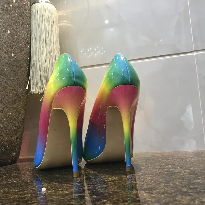 Rainbow multicolour patent leather women's high heel shoe with thin heel and pointed toe.
