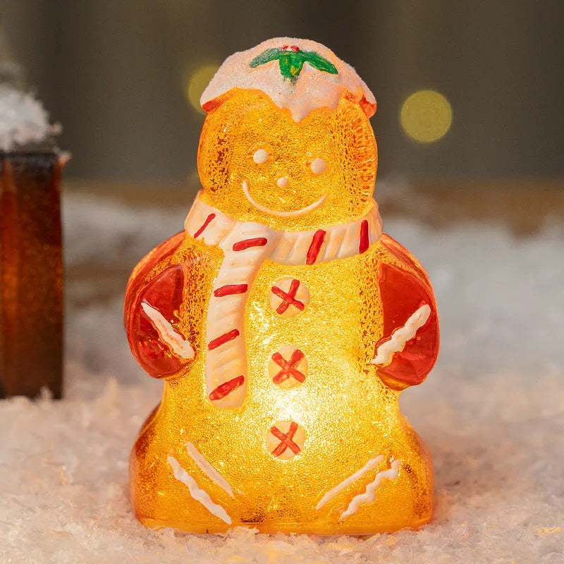 Glowing gingerbread man Christmas ornament with red scarf, plastic decoration measuring 6.5x4x10.5cm