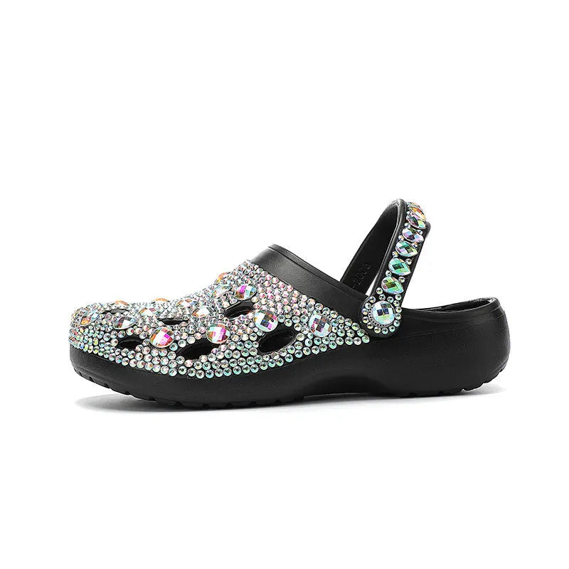 Black platform sandals for women with a rhinestone hole design and EVA construction.