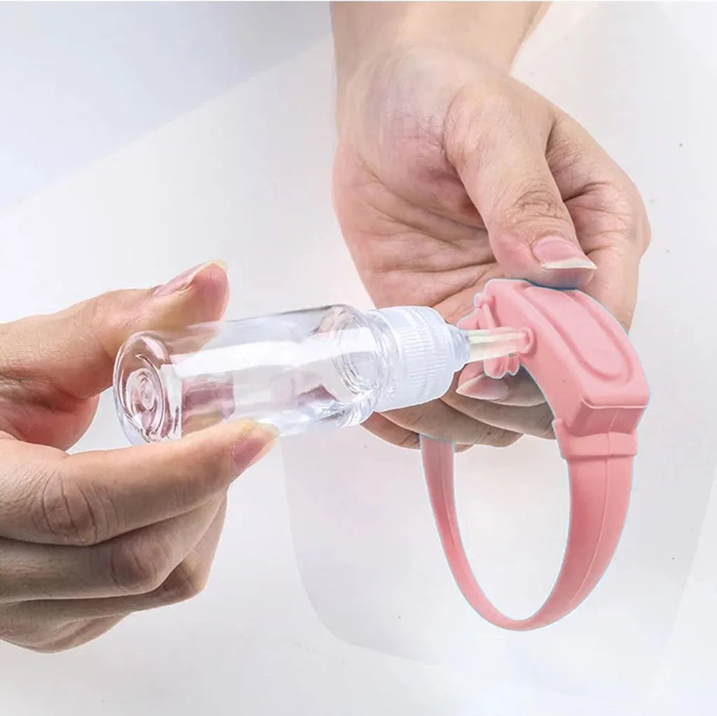 Portable hand sanitizer dispenser bracelet in silicone TPU with two refill caps, shown on a wrist