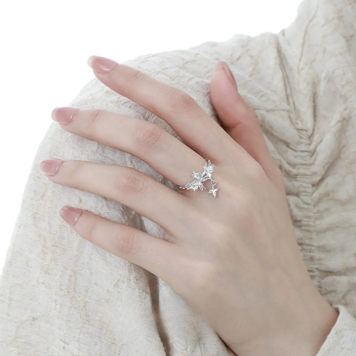 Silver adjustable open ring with butterfly design in 18K gold and white gold electroplated finishes