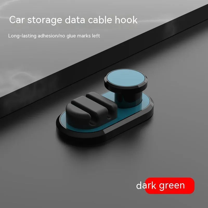 Car data cable storage hook in dark green with adhesive mount for vehicle interiors